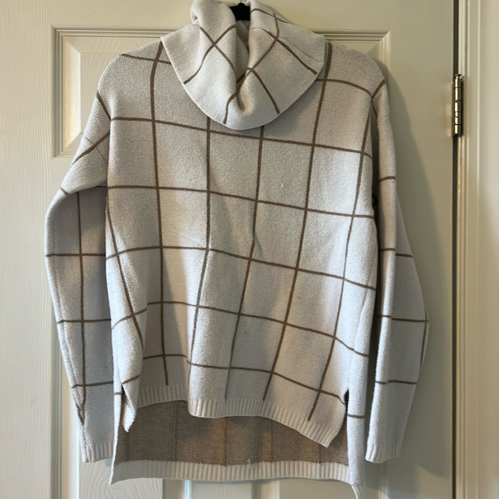 Cream and brown striped turtle neck sweater